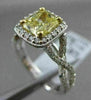 ESTATE 1.82CTW GIA FANCY YELLOW DIAMOND 18KT WHITE GOLD HALO ENGAGEMENT RING