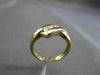 ESTATE .12CT ROUND DIAMOND 14KT YELLOW GOLD 3 STONE CHANNEL INFINITY RING #14197