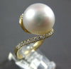 LARGE .32CT DIAMOND & AAA SOUTH SEA PEARL 18KT YELLOW GOLD CRISS CROSS LOVE RING