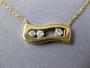 ESTATE .17CT DIAMOND 18KT WHITE & ROSE GOLD 3 STONE ETOILE FLOATING LOVE PENDANT