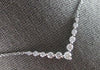 .59CT DIAMOND 14KT WHITE GOLD 3D GRADUATING V SHAPE SHARED PRONG LOVE NECKLACE