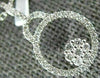 ESTATE .17CT DIAMOND 18KT WHITE GOLD 3D CIRCE OF LIFE FLOWER FLOATING PENDANT