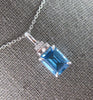 2.58CT DIAMOND & AAA BLUE TOPAZ 14KT WHITE GOLD 3D EMERALD CUT & ROUND PENDANT