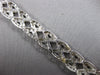 WIDE 4.20CT DIAMOND 14KT WHITE GOLD ROUND CRISS CROSS INFINITY TENNIS BRACELET
