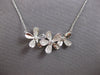 ESTATE .21CT DIAMOND 14KT WHITE GOLD 3D TRIPLE FLOWER LOVE NECKLACE #28158