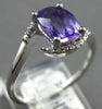 1.67CT DIAMOND & AAA AMETHYST 14KT WHITE GOLD CUSHION & ROUND CRISS CROSS RING