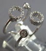 ESTATE WIDE .20CT DIAMOND 18K WHITE GOLD CLASSIC CIRCLE OF LIFE TENSION FUN RING