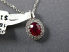 SMALL .62CT DIAMOND & AAA RUBY 18KT WHITE GOLD 3D ROUND & OVAL FLOWER PENDANT