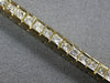 ESTATE 4.54CT DIAMOND 14K YELLOW GOLD PRINCESS CHANNEL INVISIBLE TENNIS BRACELET