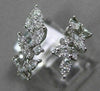 ESTATE WIDE 18KT WHITE GOLD LOVE RING. 3D MULTI LEAF CRISS CROSS DESIGN