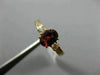 1.40CT ROUND DIAMOND & OVAL RHODOLITE 14KT ROSE GOLD THREE STONE ENGAGEMENT RING