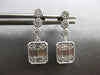 ESTATE .45CT DIAMOND 14KT WHITE GOLD ROUND & BAGUETTE INVISIBLE HANGING EARRINGS