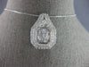 EXTRA LARGE 2.20CT DIAMOND 14KT WHITE GOLD ROUND & BAGUETTE DOUBLE HALO PENDANT