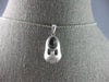 ESTATE .12CT DIAMOND 14K WHITE GOLD MATTE & SHINY BABYGIRL SHOE FLOATING PENDANT
