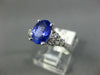1.62CT DIAMOND & AAA TANZANITE 14KT WHITE GOLD OVAL & ROUND ENGAGEMENT RING