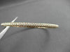 ESTATE 1.71CT DIAMOND 14KT ROSE GOLD 3mm CLASSIC THREE ROW PAVE BANGLE F/G VS