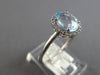 2.12CT DIAMOND & AAA AQUAMARINE 18KT WHITE GOLD 3D OVAL & ROUND ENGAGEMENT RING