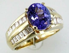 3.95CT DIAMOND & AAA TANZANITE 14KT YELLOW GOLD OVAL & BAGUETTE ENGAGEMENT RING