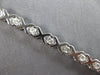 ESTATE 1.29CT DIAMOND 14KT WHITE GOLD 3D CLASSIC ROUND XO LOVE TENNIS BRACELET