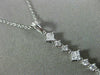 ESTATE LONG .56CT DIAMOND 18K WHITE GOLD CLASSIC JOURNEY INVISIBLE PENDANT 19808