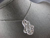EXTRA LARGE 2.55CT DIAMOND 18KT WHITE GOLD ROUND & BAGUETTE FLORAL LOVE PENDANT