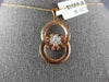 ESTATE .19CT DIAMOND 18KT ROSE GOLD 3D FLOWER CIRCULAR LOVE KNOT FUN PENDANT