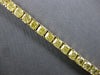 GIA LARGE 20.77CT FANCY YELLOW DIAMOND 18KT YELLOW GOLD CUSHION TENNIS BRACELET