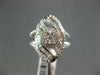 LARGE .77CT DIAMOND 14KT WHITE GOLD ROUND & BAGUETTE FLOWER LEAF ENGAGEMENT RING