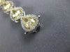 EXTRA LARGE 19.42CT WHITE & FANCY YELLOW DIAMOND 18KT WHITE GOLD TENNIS BRACELET