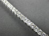 ESTATE WIDE 6.65CT PRINCESS CUT DIAMOND 18KT WHITE GOLD CLASSIC TENNIS BRACELET