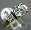 ESTATE .42CT BAGUETTE & ROUND DIAMOND & CUBIC ZIRCONIUM PLATINUM ENGAGEMENT RING