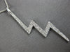 ESTATE LARGE .02CT DIAMOND 18K WHITE GOLD ZIG ZAG LIGHTNING FUN FLOATING PENDANT