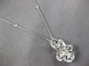 EXTRA LARGE 2.55CT DIAMOND 18KT WHITE GOLD ROUND & BAGUETTE FLORAL LOVE PENDANT