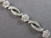 ESTATE 3.10CT DIAMOND 14KT WHITE GOLD MULTI FLOWER INFINITY LOVE TENNIS BRACELET