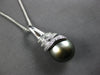 LARGE .07CT DIAMOND & AAA TAHITIAN PEARL 14KT WHITE GOLD SWIRL FLOATING PENDANT