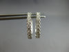 ESTATE .84CT DIAMOND 14KT WHITE GOLD CLASSIC ROUND OVAL HUGGIE HANGING EARRINGS