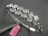 2.67CT DIAMOND 18K WHITE GOLD OVAL BEZEL INVISIBLE SEMI ETERNITY BANGLE BRACELET