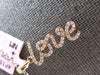 ESTATE .16CT DIAMOND 14KT ROSE GOLD 3D SCRIPT LOVE FLOATING PENDANT