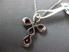 1.17CT DIAMOND & RUBY 18KT WHITE GOLD ROUND & PEAR SHAPE CROSS FLOATING PENDANT