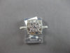 .59CT DIAMOND 14KT WHITE GOLD ROUND & BAGUETTE CLUSTER SQUARE FILIGREE LOVE RING