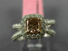 ESTATE 1.24CT WHITE & BROWNISH ORANGE DIAMOND 18KT WHITE & ROSE GOLD LOVE RING
