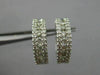 ESTATE .50CT DIAMOND 14KT WHITE GOLD 3D CLASSIC ROUND 3D ETOILE HUGGIE EARRINGS