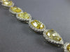 EXTRA LARGE 19.42CT WHITE & FANCY YELLOW DIAMOND 18KT WHITE GOLD TENNIS BRACELET