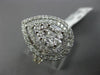 LARGE 18KT WHITE GOLD ENGAGEMENT RING. 3D CLUSTER PEAR SHAPE DOUBLE HALO DESIGN