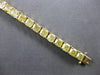 GIA LARGE 20.77CT FANCY YELLOW DIAMOND 18KT YELLOW GOLD CUSHION TENNIS BRACELET