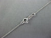 1.84CT WHITE & BLACK DIAMOND 14K WHITE GOLD CIRCULAR PEACE SIGN FLOATING PENDANT