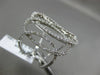 ESTATE LARGE .97CT DIAMOND 18KT WHITE GOLD 3D MULTI OVAL INTERTWINING FUN RING
