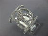 ESTATE LARGE .84CT DIAMOND 18KT WHITE GOLD CIRCLE OF LIFE INTERTWINING FUN RING