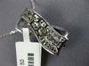 ESTATE .76CT WHITE & GREEN DIAMOND 18KT WHITE GOLD MULTI ROW CRISS CROSS PENDANT