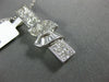 ESTATE 1.36CT DIAMOND 18KT WHITE GOLD PRINCESS ROUND & BAGUETTE BAR BOW PENDANT